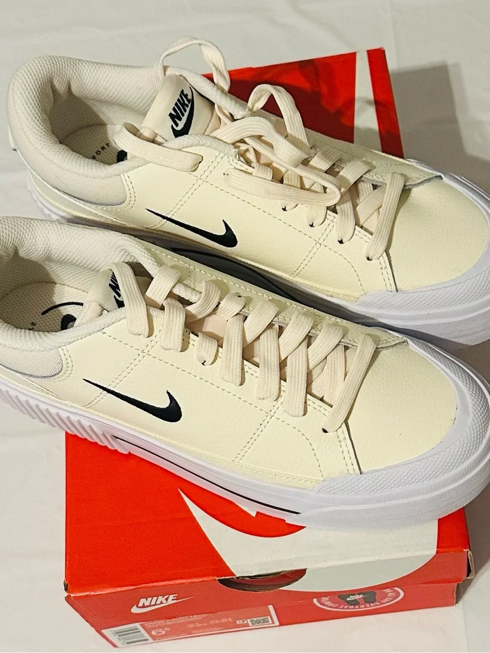 Nike Women’s Cream and Black Low-Top Platform Sneakers